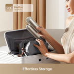 Load image into Gallery viewer, Dreame Pocket Hair Dryer held by a woman, showcasing its lightweight and portable design.