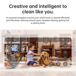 Load image into Gallery viewer, Child interacting with a dog as Dreame L10s Ultra Robot Vacuum navigates room.