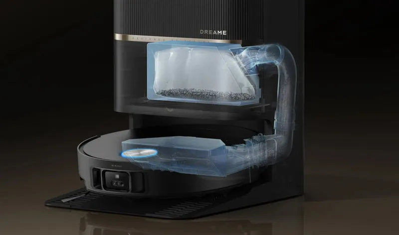 Robot vacuum docking station emptying debris into its sealed dust bag.