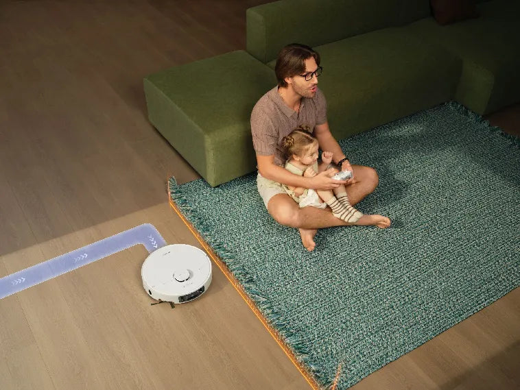 Robot vacuum cleaning a selected zone set from the app and avoiding a no-go carpet zone.