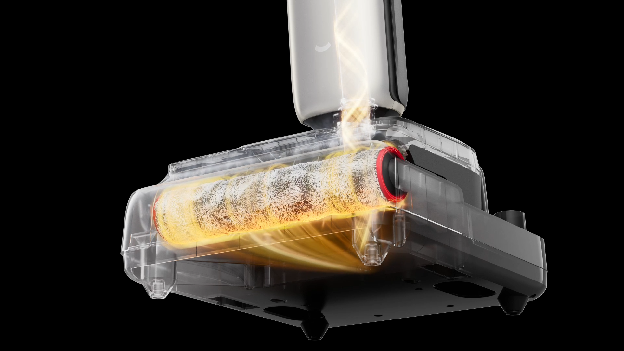 Dreame hard floor cleaner self-cleaning in its dock with hot water.