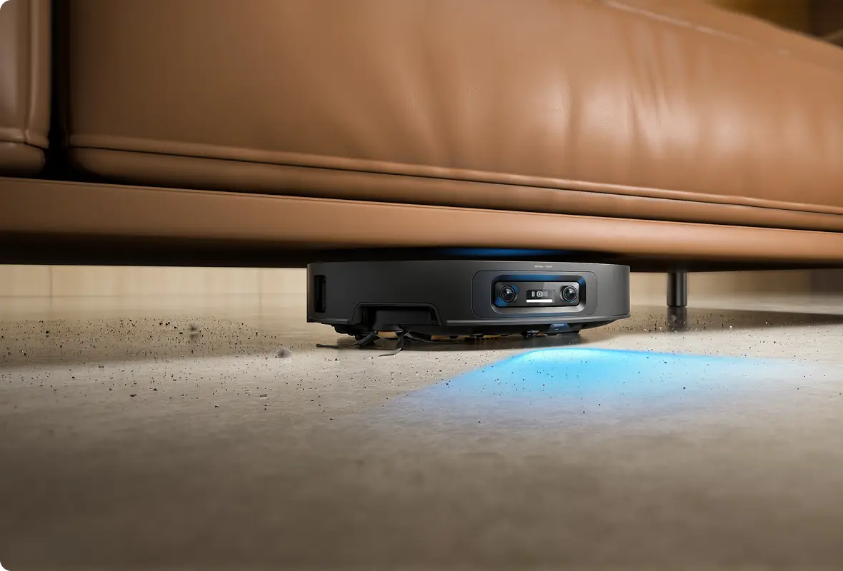Dreame X60 Max Ultra cleaning pet hair under a sofa