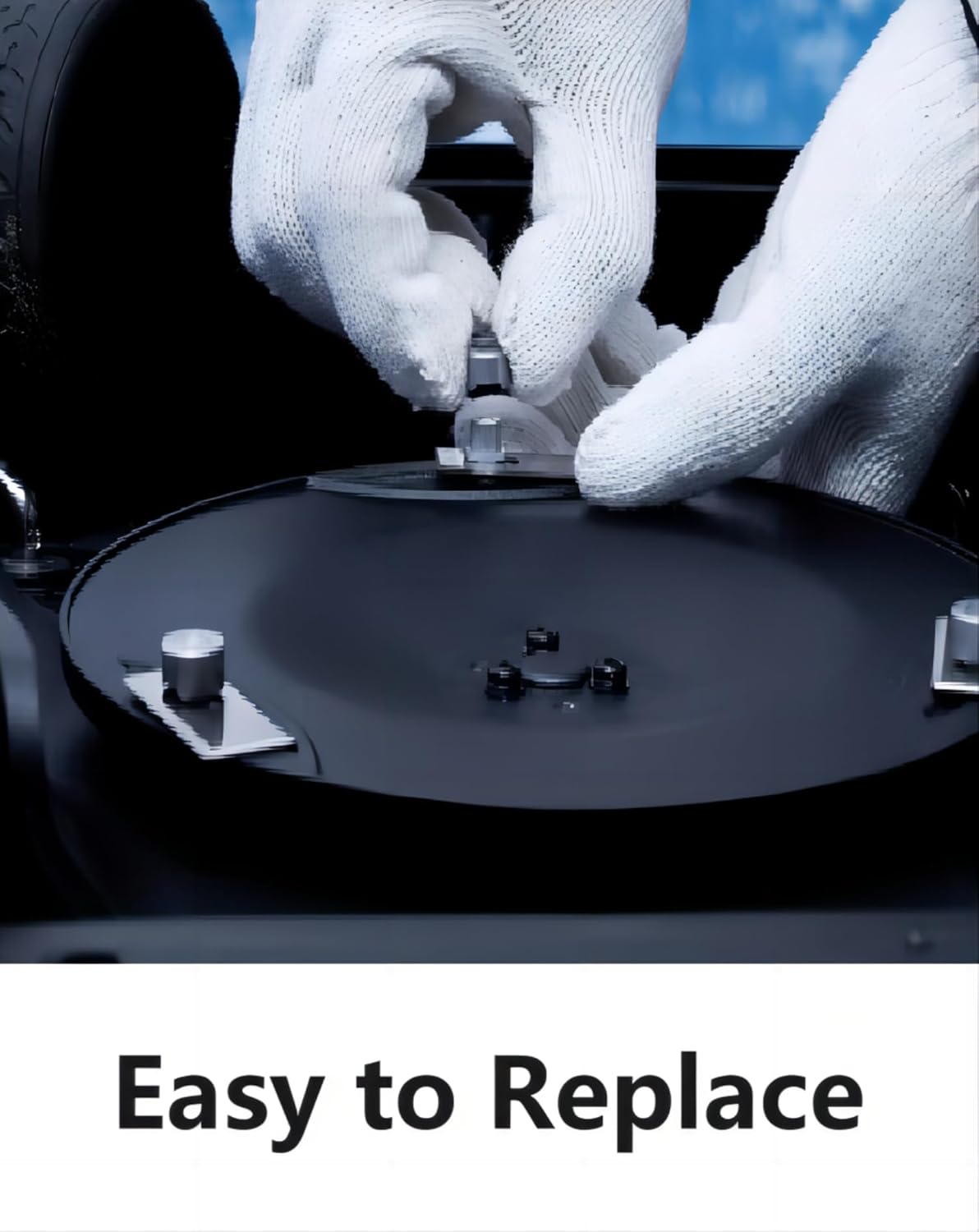 User replacing a blade on Dreame robotic mower with easy-detach design.