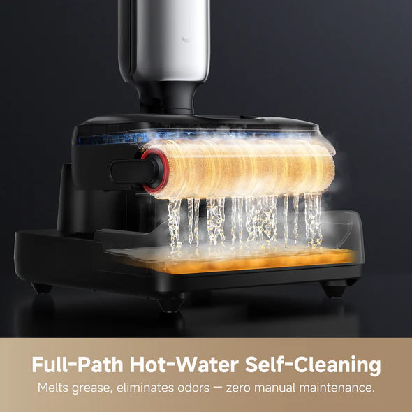 Floor vacuum self-cleaning and hot-air drying in its dock between uses.
